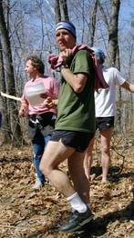 An orienteer takes his Billygoat t-shirt.